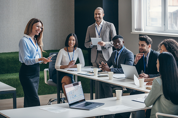Seminar presenter discussing with attendees